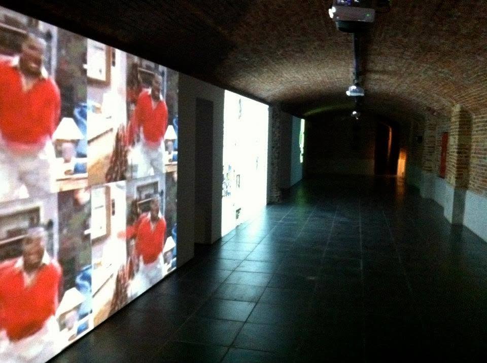 Multiple video projections in a vaulted gallery