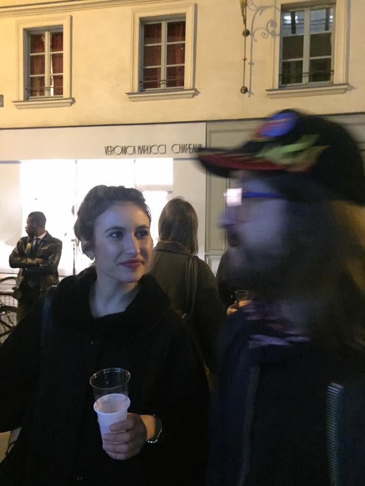 Visitors outside an exhibition opening